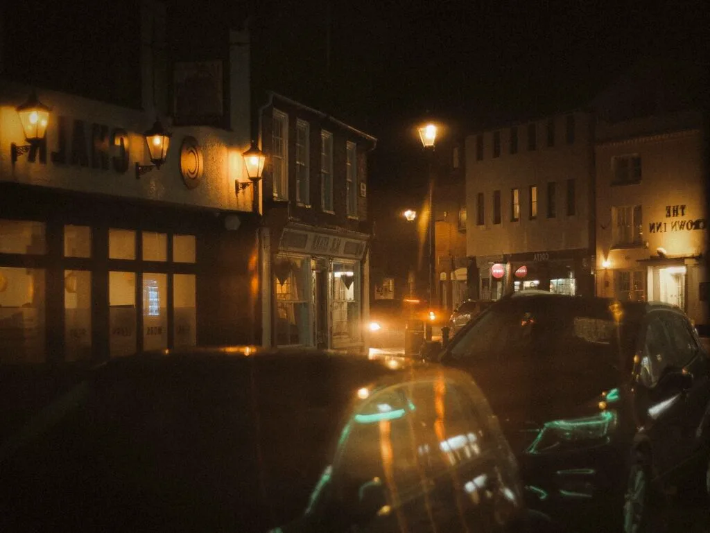 Wet street reflections and rain drops in Emsworth at night
