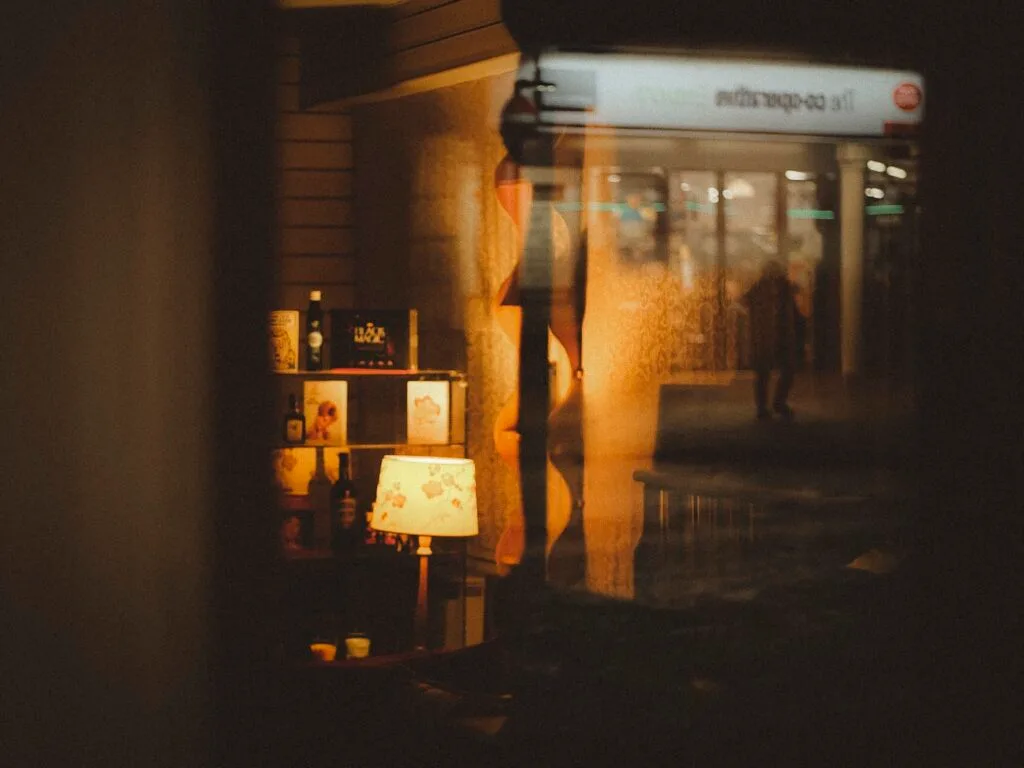 Rain reflections on Emsworth pavement at night