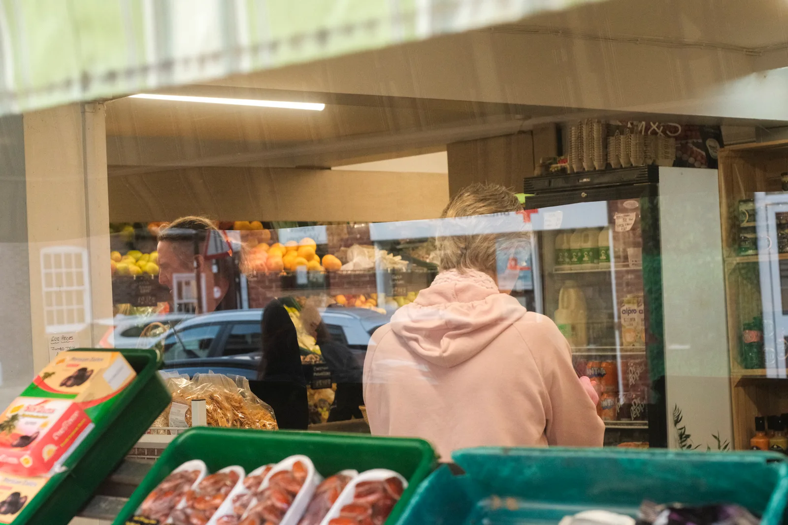 Customer at local shop counter in Emsworth